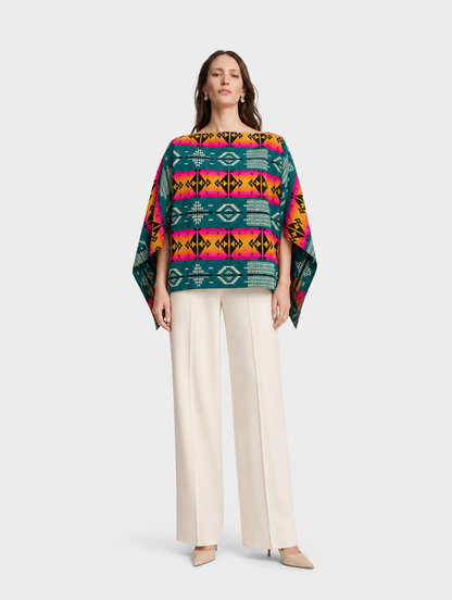SISA poncho blusa doble faz - cara turquesa en cuello barco, frontal